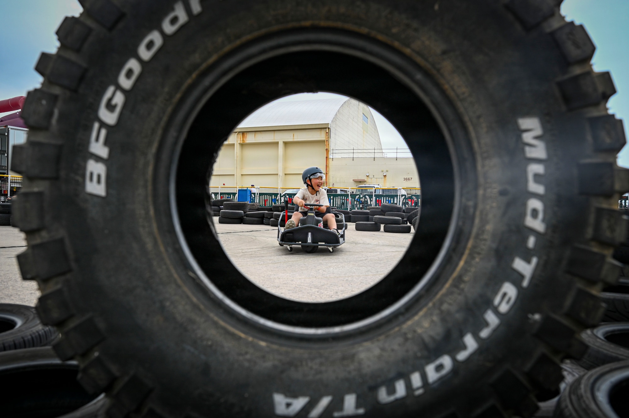A festival attendee rides a go-kart during America Fest 2026 at Kadena Air Base, Japan.