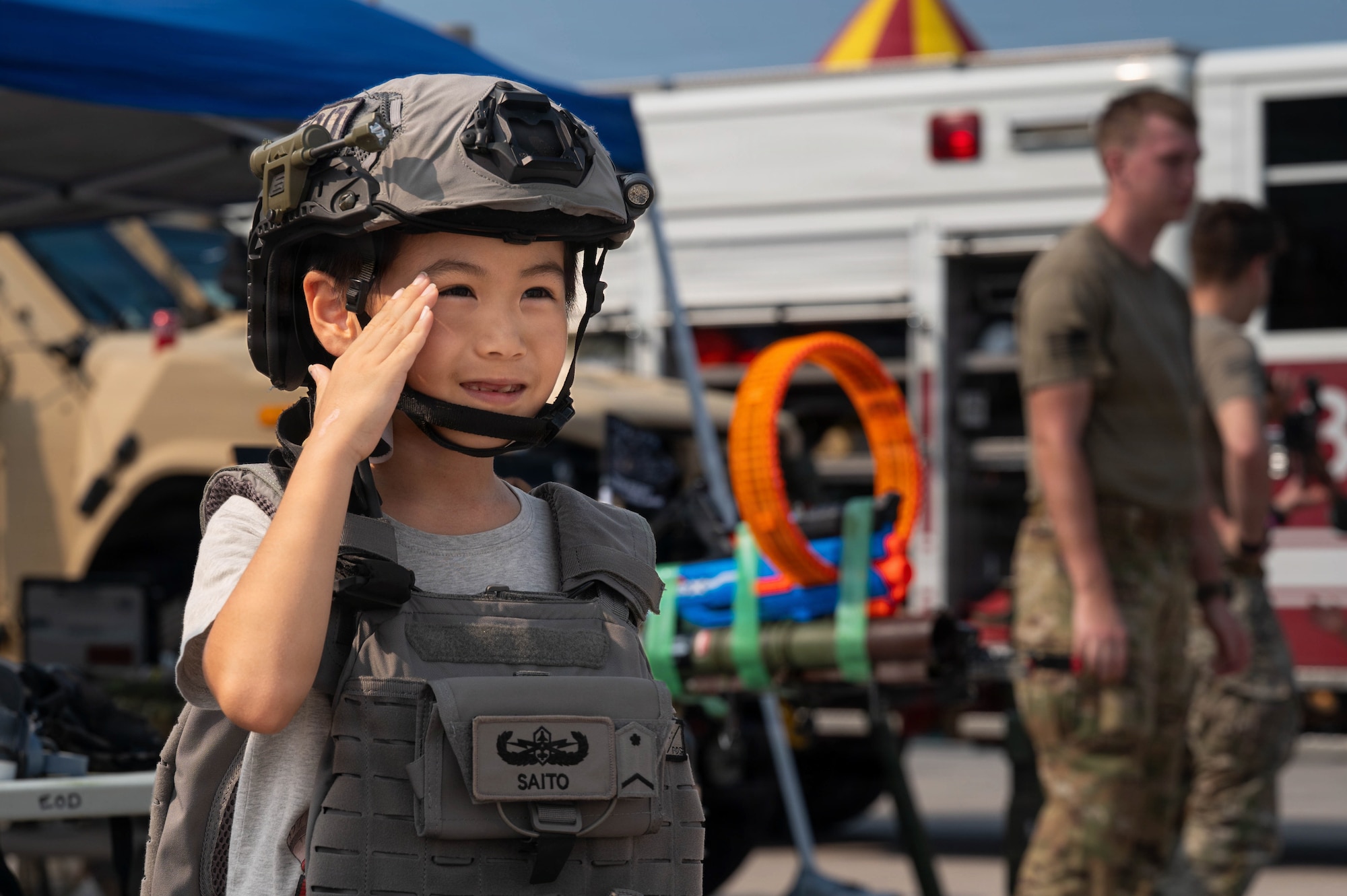 A Festival attendee participates at a Japan Air Self-Defense Force booth during America Fest 2026 at Kadena Air Base, Japan.