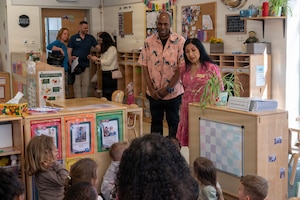 Teddy Rice, left, Child Development Center assistant director, and Vilma M. Williams, right, senior manager for the Early Childhood Education Competency and Special Populations Program at the Council for Professional Recognition, speak to children at Ramstein Air Base, Germany, April 16, 2026.