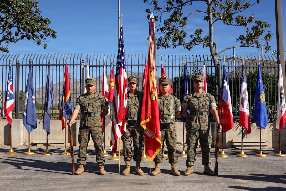 U.S. Marines with 2nd Battalion, 23rd Marine Regiment, 4th Marine Division, stand with colors in Pasadena, Calif., March 14, 2026. During the ceremony, Lt. Col. Davis B. Gooding III relinquished command of the battalion to Lt. Col. Michael P. Smith. The ceremony signified the transfer of accountability, responsibility and authority to new leadership and the continuity of command. (U.S. Marine Corps photo by Lance Cpl. Adrian Estrada)