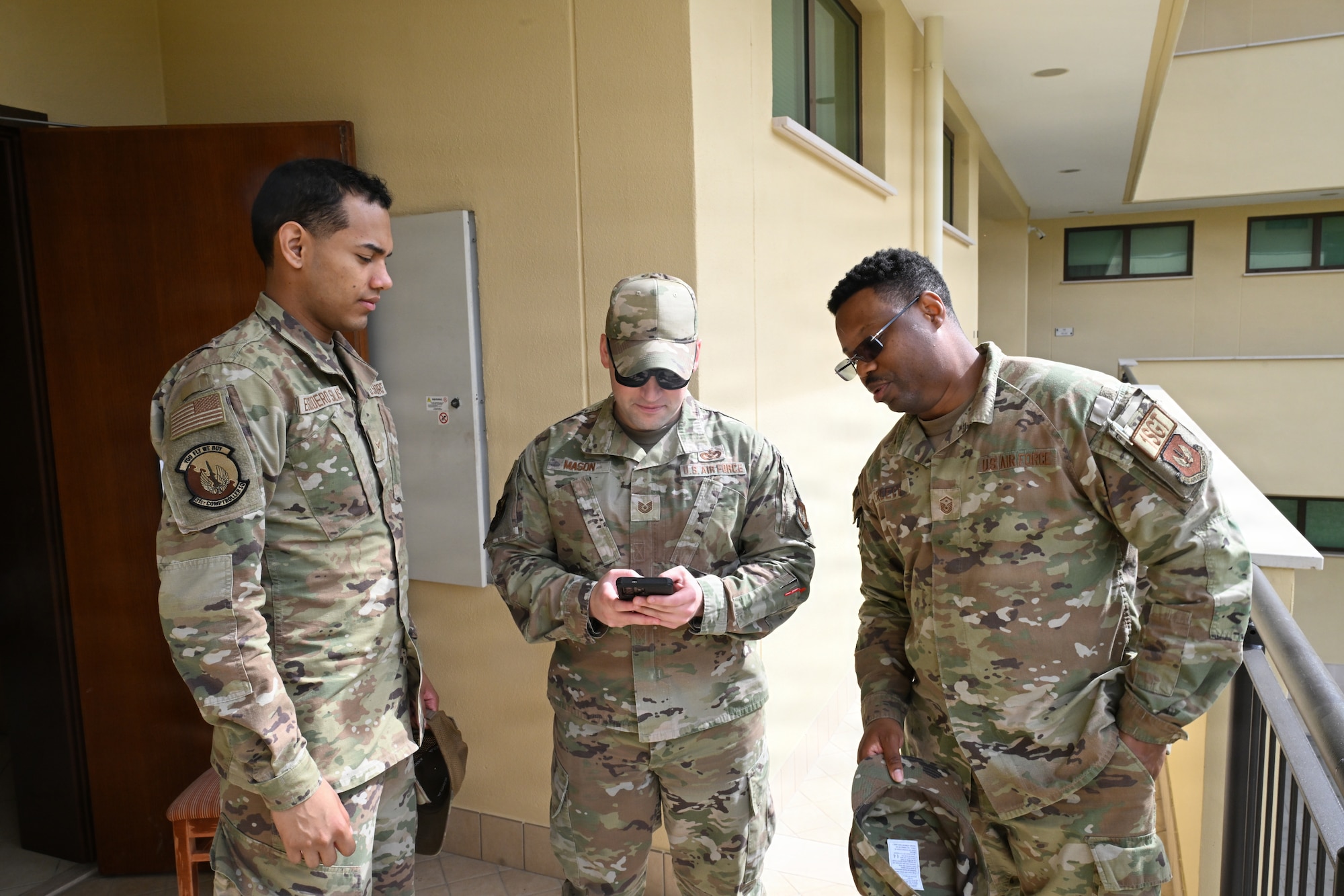Sergeants getting ready for Airman's dorm inspection.