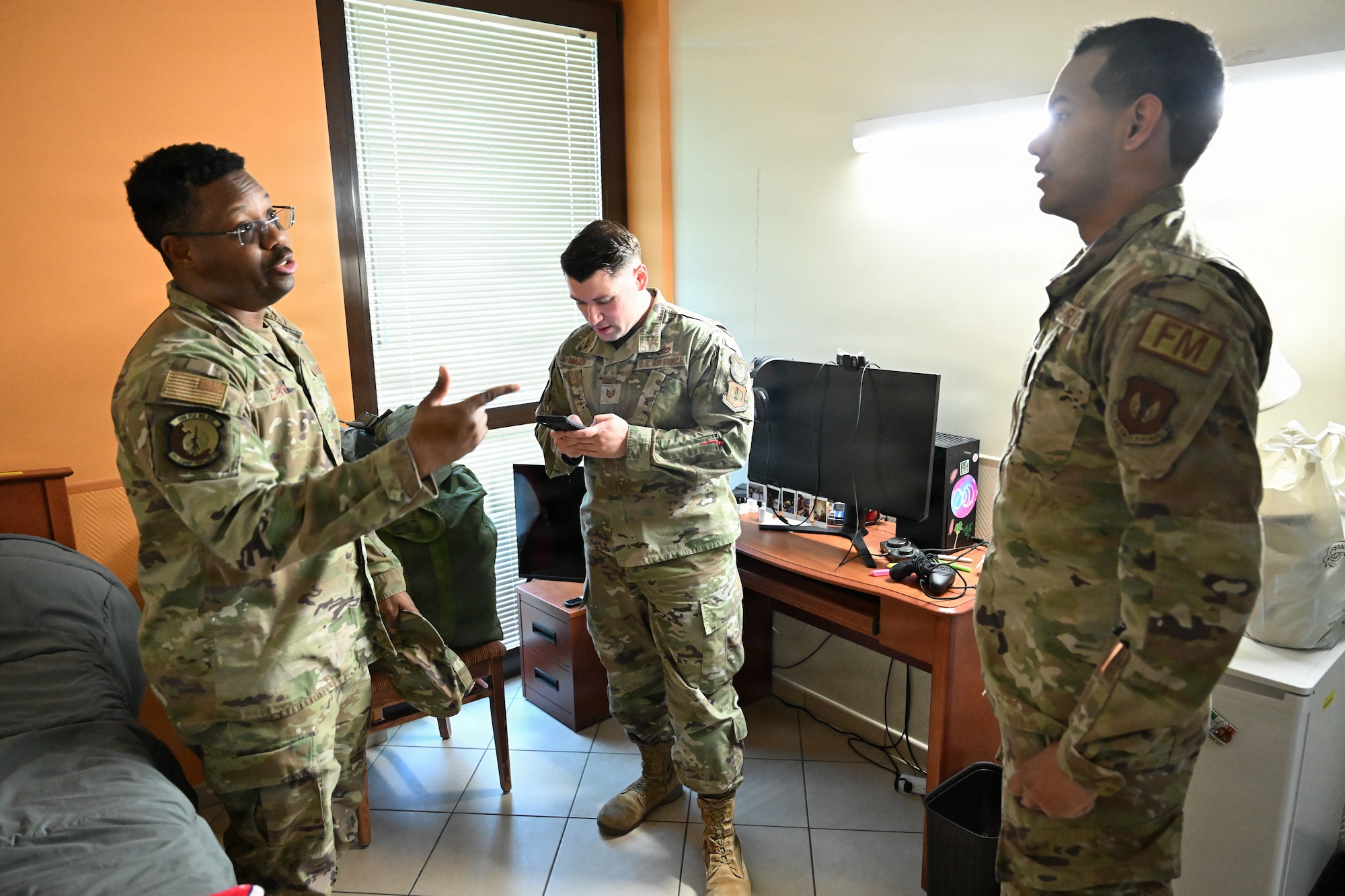 Sergeants inspects airman's dorm.