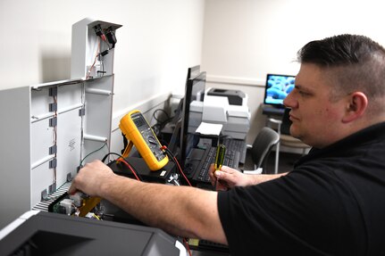 Mark Kisel, lead biomedical equipment technician at U.S. Army Medical Logistics Command’s Medical Maintenance Operations Division at Tobyhanna Army Depot, Pennsylvania, performs checks on a medical device. Kisel is one of several technicians from MMOD-PA who are part of the division’s “fly-away team,” a group of expert techs who can deploy into the field to provide maintenance support to operational units.