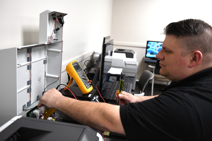 Mark Kisel, lead biomedical equipment technician at U.S. Army Medical Logistics Command’s Medical Maintenance Operations Division at Tobyhanna Army Depot, Pennsylvania, performs checks on a medical device. Kisel is one of several technicians from MMOD-PA who are part of the division’s “fly-away team,” a group of expert techs who can deploy into the field to provide maintenance support to operational units.