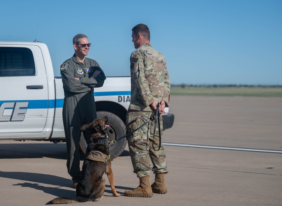U.S. Air Force Chief of Staff Gen. Ken Wilsbach speaks to a Security Forces defender during an immersion at Altus Air Force Base, Oklahoma, April 16, 2026. Highlighting the critical role Altus Airmen play in flying and maintaining some of the Air Force’s most vital aircraft, the senior leaders spent time on the flightline engaging with Airmen across multiple career fields. (U.S. Air Force photo by Airman 1st Class Emma Wright)
