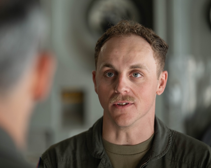 U.S. Staff Sgt. Kyle Hill, 58th Airlift Squadron aircrew, briefs U.S. Air Force Chief of Staff Gen. Ken Wilsbach on C-17 Globemaster III aircraft operations during an immersion tour at Altus Air Force Base, Okla., April 16, 2026. The C-17 is capable of rapid strategic delivery of troops and all types of cargo to main operating bases or directly to forward bases in the deployment area. (U.S. Air Force photo by Airman 1st Class Emma Wright)