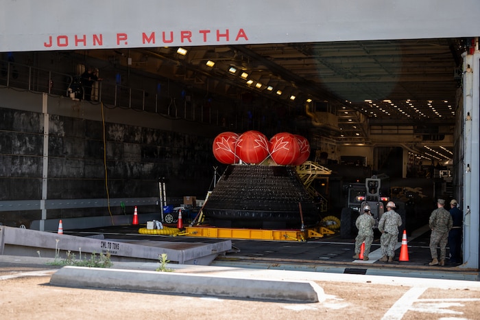 The Orion crew module sits in the welldeck of the amphibious transport dock USS John P. Murtha (LPD 26) after supporting NASA’s Artemis II recovery, April 11, 2026.