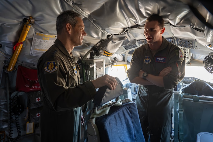 U.S. Air Force Chief of Staff Gen. Ken Wilsbach, left, speaks with Capt. Leif Joffre, 54th Aerial Refueling Squadron, right, during an immersion of the KC-135 Stratotanker with the 97th Air Mobility Wing, at Altus Air Force Base, Oklahoma, April 16, 2026. This unique asset showcases the U.S. Air Force’s ability to remain mission ready because it enhances the Air Force's capability to accomplish its primary mission of global reach. It also provides aerial refueling support to Air Force, Navy, Marine Corps and allied nation aircraft. (U.S. Air Force photo by Airman 1st Class Nathan Langston)