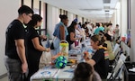 New parents and family members participated in Tripler Army Medical Center’s Sixth Annual Baby Expo at TAMC, Honolulu, Hawaii, on April 11. The event featured informational booths and demonstrations focused on maternal and infant health for new parents and family members. (Defense Health Agency photo by Khinna Kaminske)
