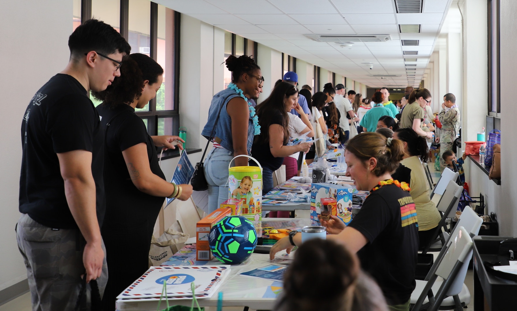 New parents and family members participated in Tripler Army Medical Center’s Sixth Annual Baby Expo at TAMC, Honolulu, Hawaii, on April 11. The event featured informational booths and demonstrations focused on maternal and infant health for new parents and family members. (Defense Health Agency photo by Khinna Kaminske)