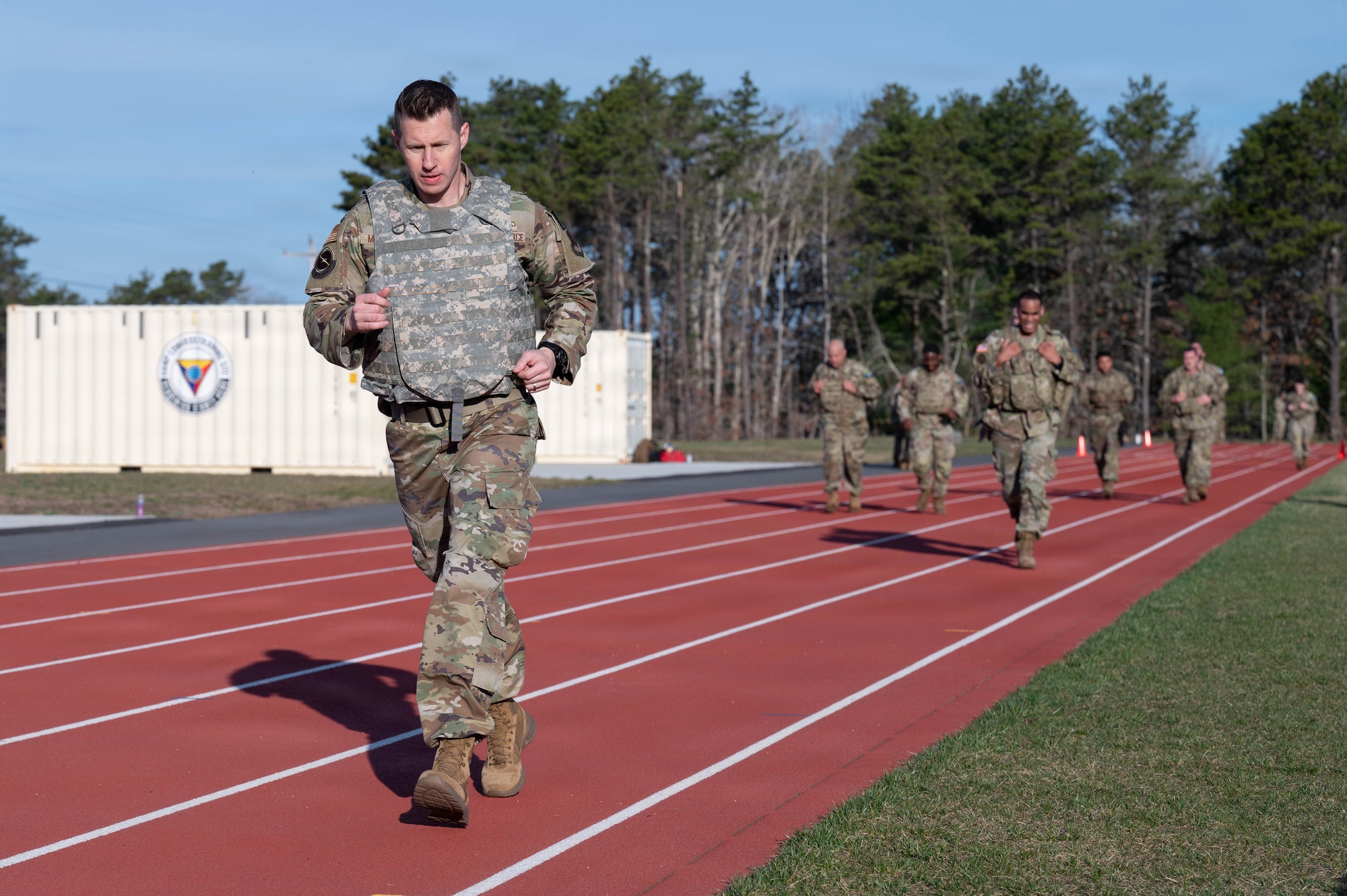 Airman runs on a track.