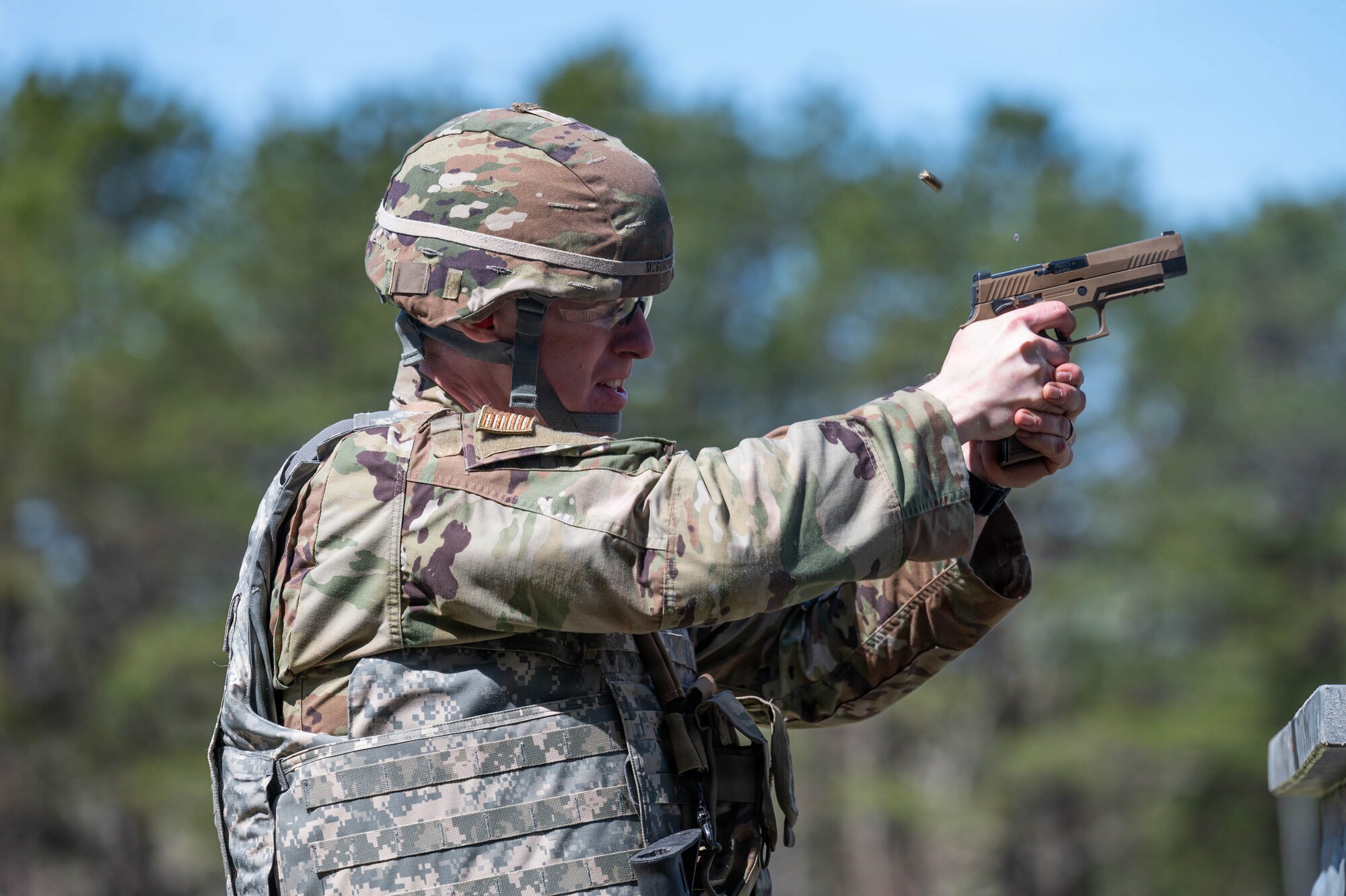 Airman shoots at a target.