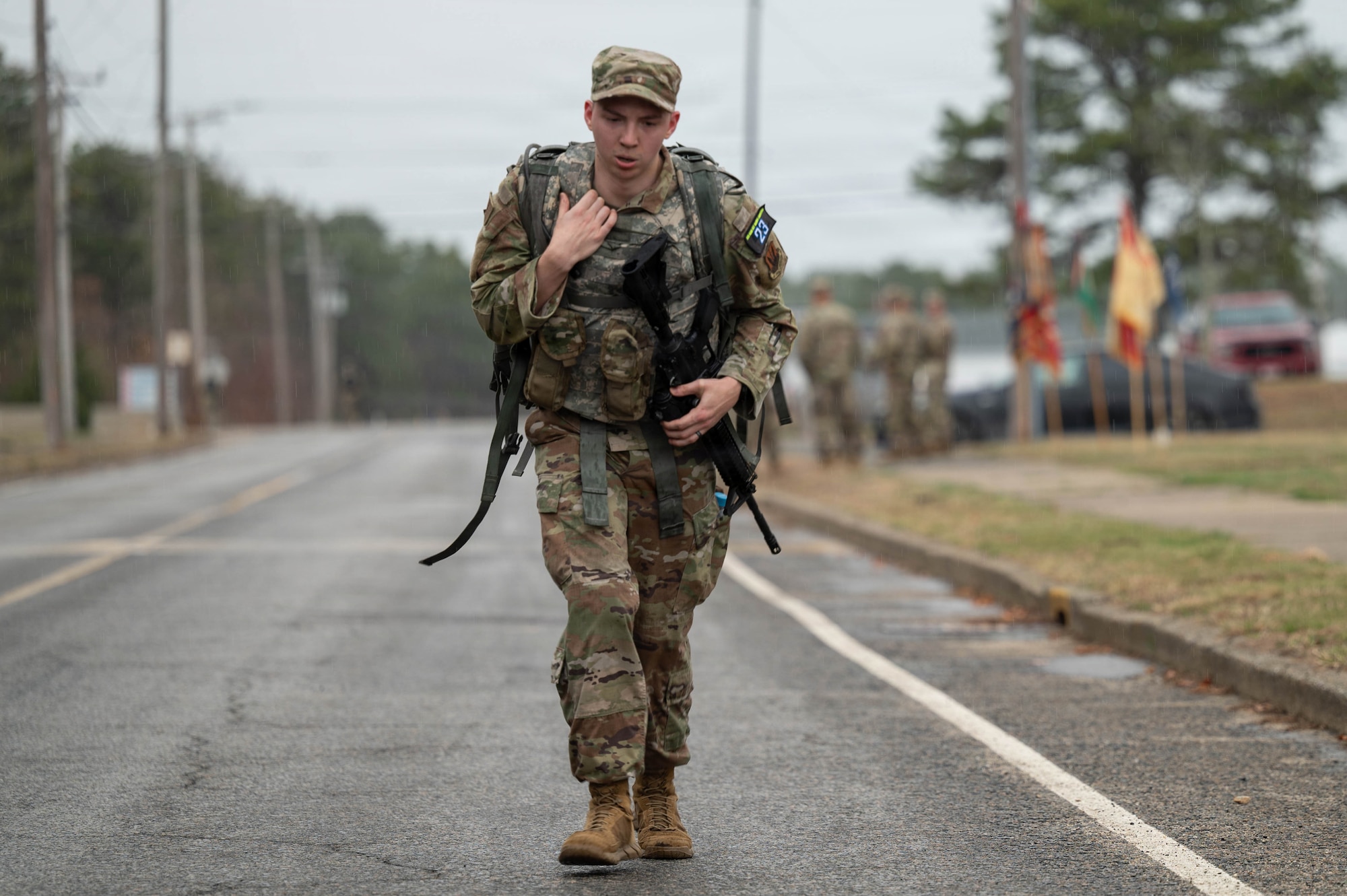 Airman carries a ruck.