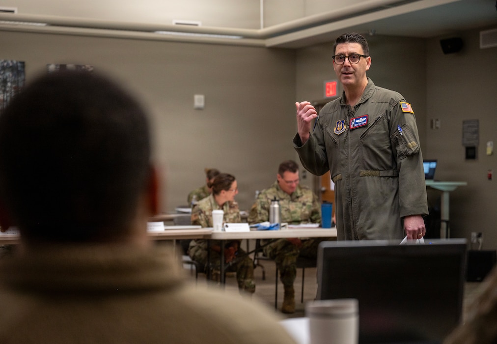 Chief Master Sgt. Chris Fisher, 79th Air Refueling Squadron senior enlisted leader and Triad Course instructor, speaks to attendees at a Triad Course at Joint Base Lewis-McChord, Washington, on April 8, 2026.