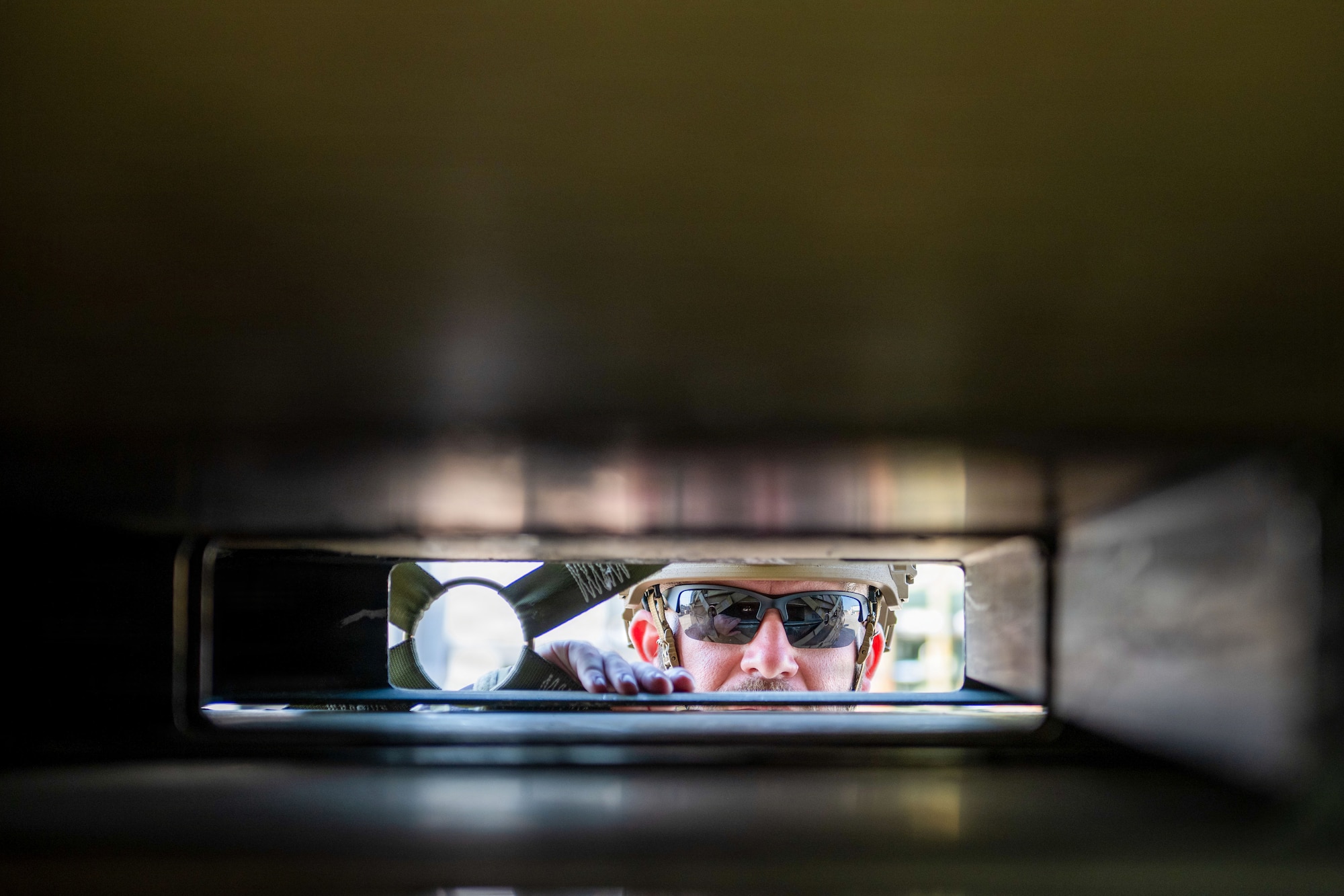 A U.S. Air Force Airman inspects and aligns cargo through a loading aperture in preparation for joint ammunition and aerial port operations at Savannah Air National Guard Base, Georgia, April 23, 2026, for Exercise Ready Tiger 26-3. The exercise reinforced combat readiness and the Wing’s ability to generate and project airpower in support of national defense objectives. (U.S. Air Force photo by Staff Sgt. Sari Seibert)
