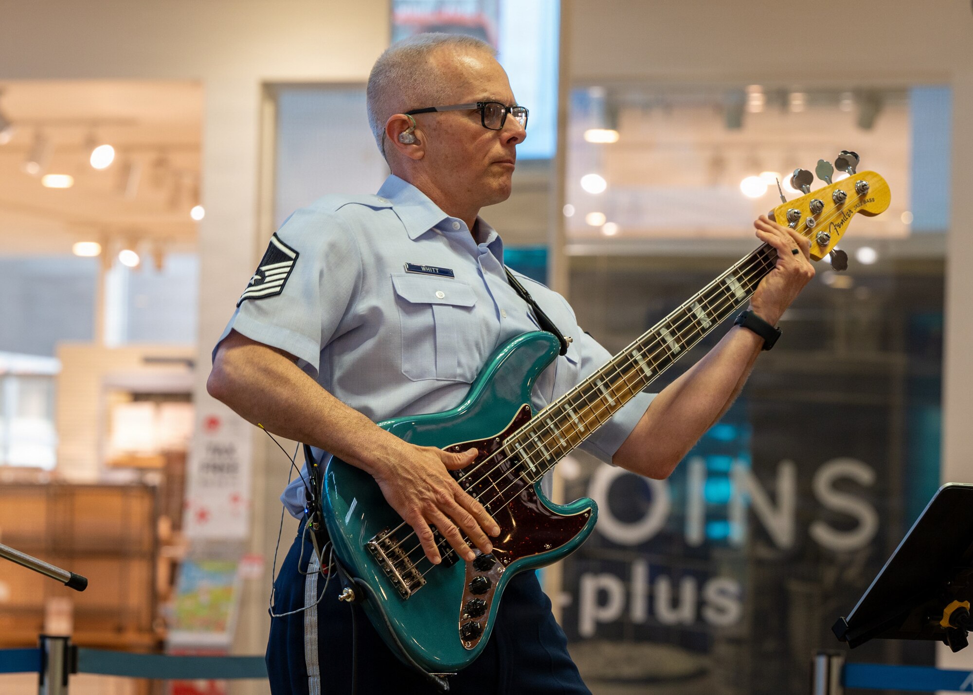 U.S. Air Force Master Sgt. Joe Whitt, U.S. Air Force Band of the Pacific bass player, performs during a show at a local mall in Kitanakagusuku, Okinawa, April 13, 2026.