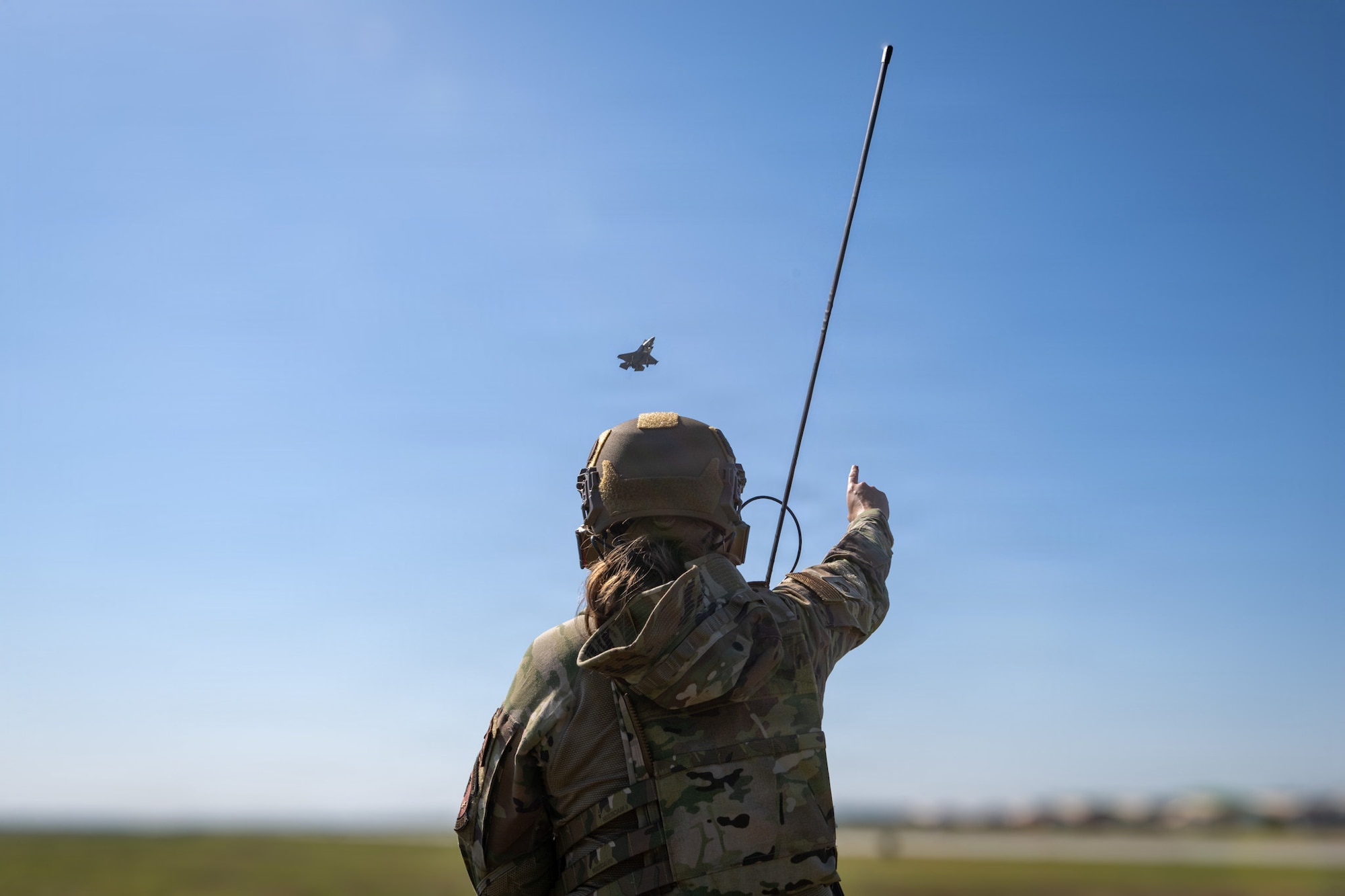 A U.S. Air Force Airman assigned to the 23d Combat Air Base Squadron directs a U.S. Marine Corps F-35B Lightning II during Exercise Ready Tiger 26-3 at McEntire Joint National Guard Base, South Carolina, April 15, 2026. McEntire acted as the contingency location for the exercise, and its rapid setup and sortie support advanced integrated operations across units to deliver combat power when and where it was needed. (U.S. Air Force Photo by Senior Airman Iain Stanley)