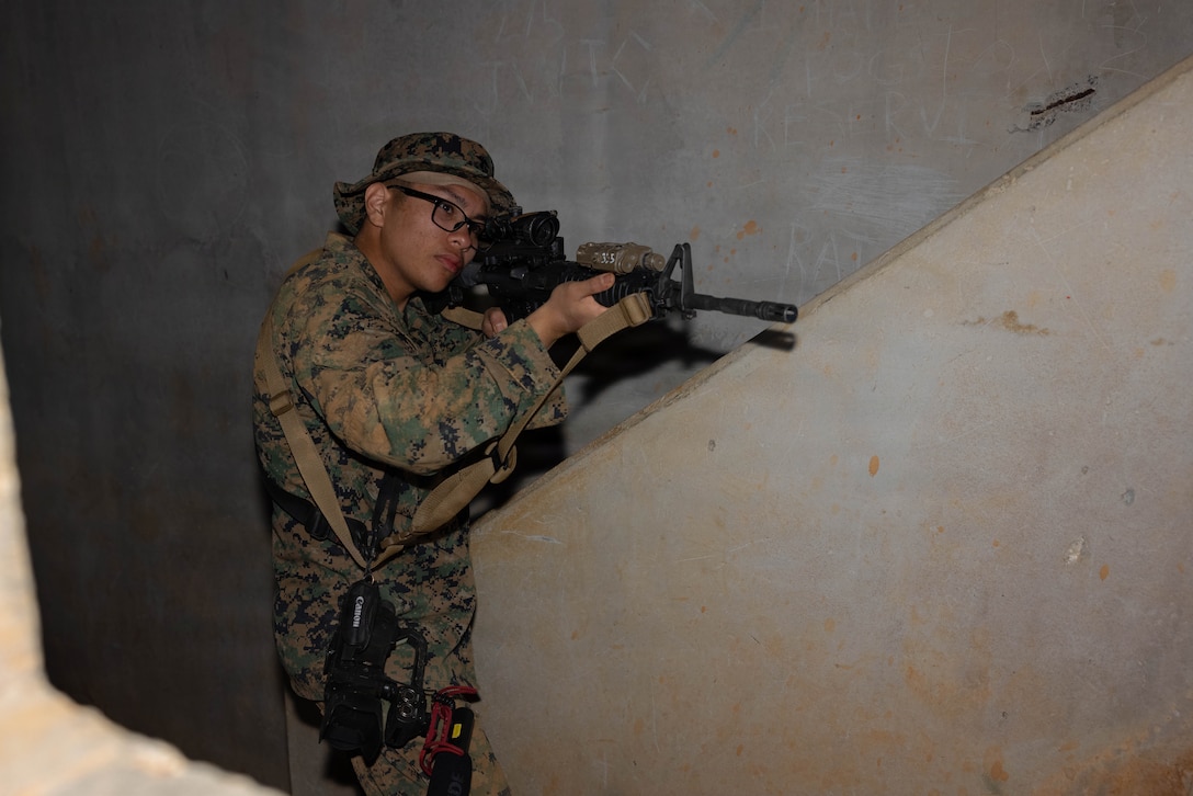 U.S. Marine Corps Lance Cpl. Miclo Rud, a combat videographer with Headquarters and Support Battalion, Marine Corps Installations Pacific, poses for a photo during a field training exercise on Camp Hansen, Okinawa, Japan, April 8, 2026. The COMMSTRAT FTX is a five-day event focused on increasing acumen and technical proficiency to provide commanders with capable COMMSTRAT forces at the tactical level. 

"I didn’t come into this exercise trying to win, I came here to learn,” said Rud. “I’m glad I have two of my mentors who teach me a lot out here I am appreciative of them.” 

He didn’t always like his job as a videographer, but day by day he learns more. Him learning about his job creates a passion and love for the job. He impresses himself every day when looking back at his footage. 

“I’m usually harsh on myself when taking my video shots, but when I get back to my desk it’s my favorite part because I realize I didn’t do as bad as I thought,” said Rud. 

We are our harshest critic, and our leaders are there for us in those times to support us, pass the knowledge to us and remind us of who we are and what we can do. (U.S. Marine Corps photo by Lance Cpl. Carlos Paz-Sosa)