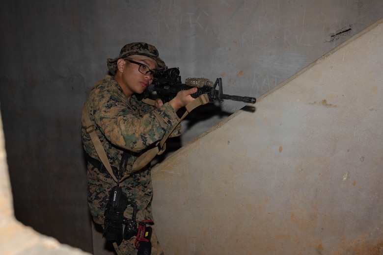 U.S. Marine Corps Lance Cpl. Miclo Rud, a combat videographer with Headquarters and Support Battalion, Marine Corps Installations Pacific, poses for a photo during a field training exercise on Camp Hansen, Okinawa, Japan, April 8, 2026. The COMMSTRAT FTX is a five-day event focused on increasing acumen and technical proficiency to provide commanders with capable COMMSTRAT forces at the tactical level. 

"I didn’t come into this exercise trying to win, I came here to learn,” said Rud. “I’m glad I have two of my mentors who teach me a lot out here I am appreciative of them.” 

He didn’t always like his job as a videographer, but day by day he learns more. Him learning about his job creates a passion and love for the job. He impresses himself every day when looking back at his footage. 

“I’m usually harsh on myself when taking my video shots, but when I get back to my desk it’s my favorite part because I realize I didn’t do as bad as I thought,” said Rud. 

We are our harshest critic, and our leaders are there for us in those times to support us, pass the knowledge to us and remind us of who we are and what we can do. (U.S. Marine Corps photo by Lance Cpl. Carlos Paz-Sosa)
