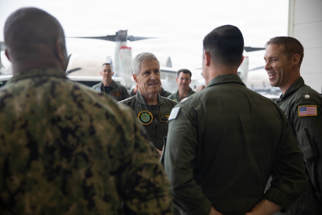 U.S. Navy Adm. Steve Koehler, commander, U.S. Pacific Fleet, speaks with pilots assigned to Carrier Air Wing 5, during a base tour at Marine Corps Air Station Iwakuni, Japan, April 15, 2026. Koehler toured MCAS Iwakuni and met with leaders to discuss combat readiness, naval forces and strengthen partnerships to ensure and secure a prosperous Indo-Pacific. (U.S. Marine Corps photo by Lance Cpl. Kenneth Garcia)