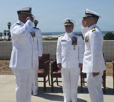 Capt. Damian Storz, (Right) relieves Capt. Charles Dickerson (Left) as commander of the Military Sealift Command hospital ship USNS Mercy (T-AH 19) Medical Treatment Facility (MTF) during a change of command ceremony at the Island Club, on Naval Air Station North Island, today, as Rear Adm. Benjamin Nicholson, commander Military Sealift Command looks on.  Storz, assumes command from Dickerson, who served as the MTF commanding officer since 2024.
