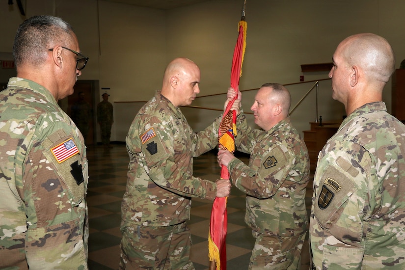 U.S. Army National Guard Soldiers, leaders and family members attend a change of command ceremony for the 166th Regiment – Regional Training Institute at Fort Indiantown Gap, Pennsylvania April 17, 2026. During the ceremony, Col. John Wenzel relinquished command to Lt. Col. Max Furman, symbolizing the transfer of authority within the organization. The 166th Regiment trains more than 5,000 Soldiers annually and serves as a premier Regional Training Institute within the Army National Guard. (U.S. Army National Guard photo by Sgt. 1st Class Shane Smith)
