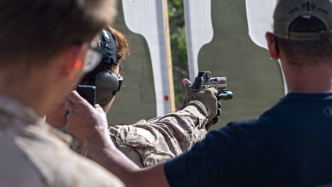 A U.S. Marine with Maritime Raid Force, 24th Marine Expeditionary Unit, conducts pistol drills during a modified qualification for close-quarter tactics training in Marion, Arkansas, April 13, 2026. The training at Tier 1 Group enhanced MRF’s knowledge of weapons and tactics, breaching, operational medicine, and lethality in preparation for the 24th MEU's upcoming deployment. (U.S. Marine Corps photo by Cpl. Daniel R. Garcia)