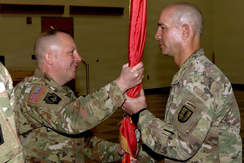 U.S. Army National Guard Soldiers, leaders and family members attend a change of command ceremony for the 166th Regiment – Regional Training Institute at Fort Indiantown Gap, Pennsylvania April 17, 2026. During the ceremony, Col. John Wenzel relinquished command to Lt. Col. Max Furman, symbolizing the transfer of authority within the organization. The 166th Regiment trains more than 5,000 Soldiers annually and serves as a premier Regional Training Institute within the Army National Guard. (U.S. Army National Guard photo by Sgt. 1st Class Shane Smith)