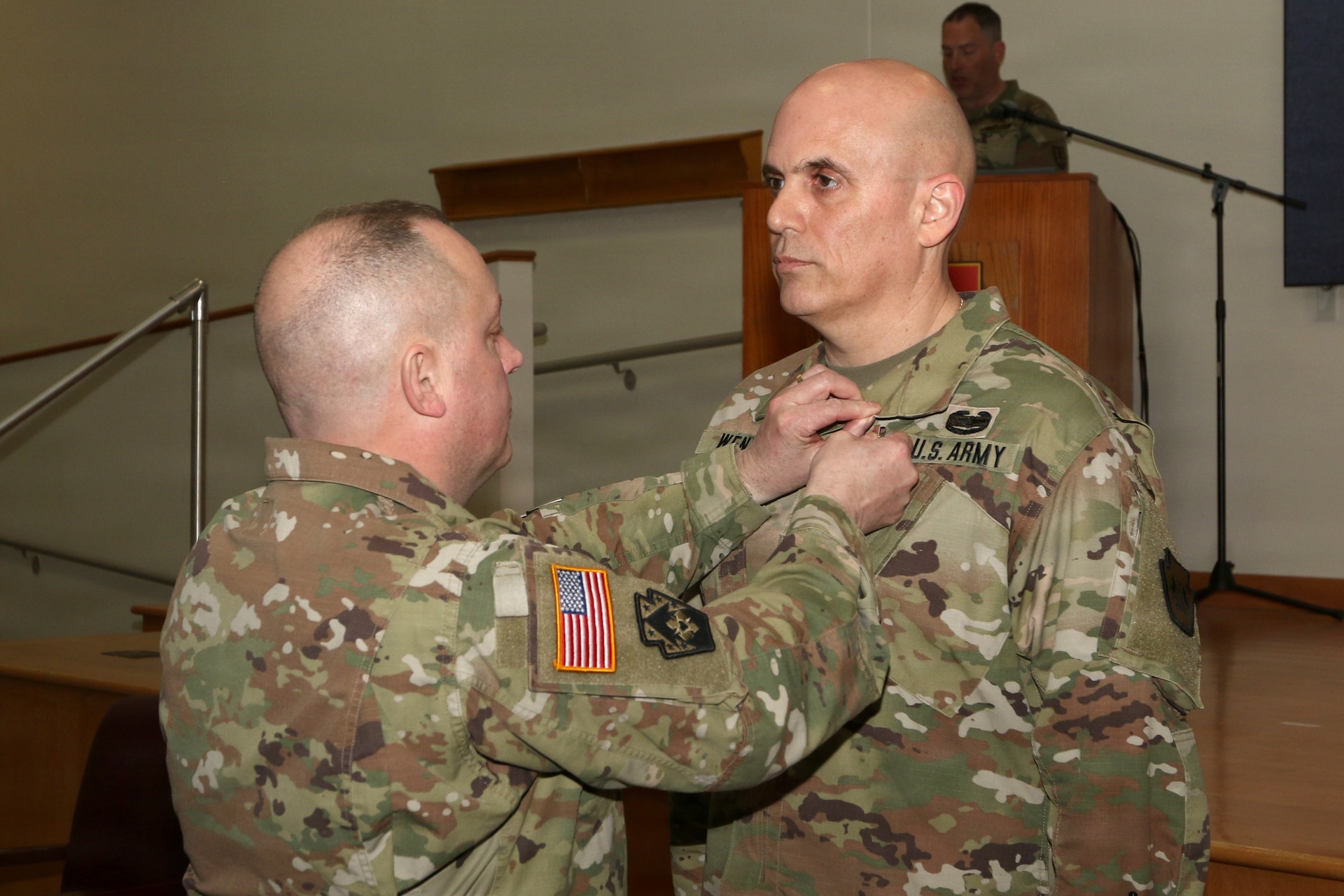 U.S. Army National Guard Soldiers, leaders and family members attend a change of command ceremony for the 166th Regiment – Regional Training Institute at Fort Indiantown Gap, Pennsylvania April 17, 2026. During the ceremony, Col. John Wenzel relinquished command to Lt. Col. Max Furman, symbolizing the transfer of authority within the organization. The 166th Regiment trains more than 5,000 Soldiers annually and serves as a premier Regional Training Institute within the Army National Guard. (U.S. Army National Guard photo by Sgt. 1st Class Shane Smith)