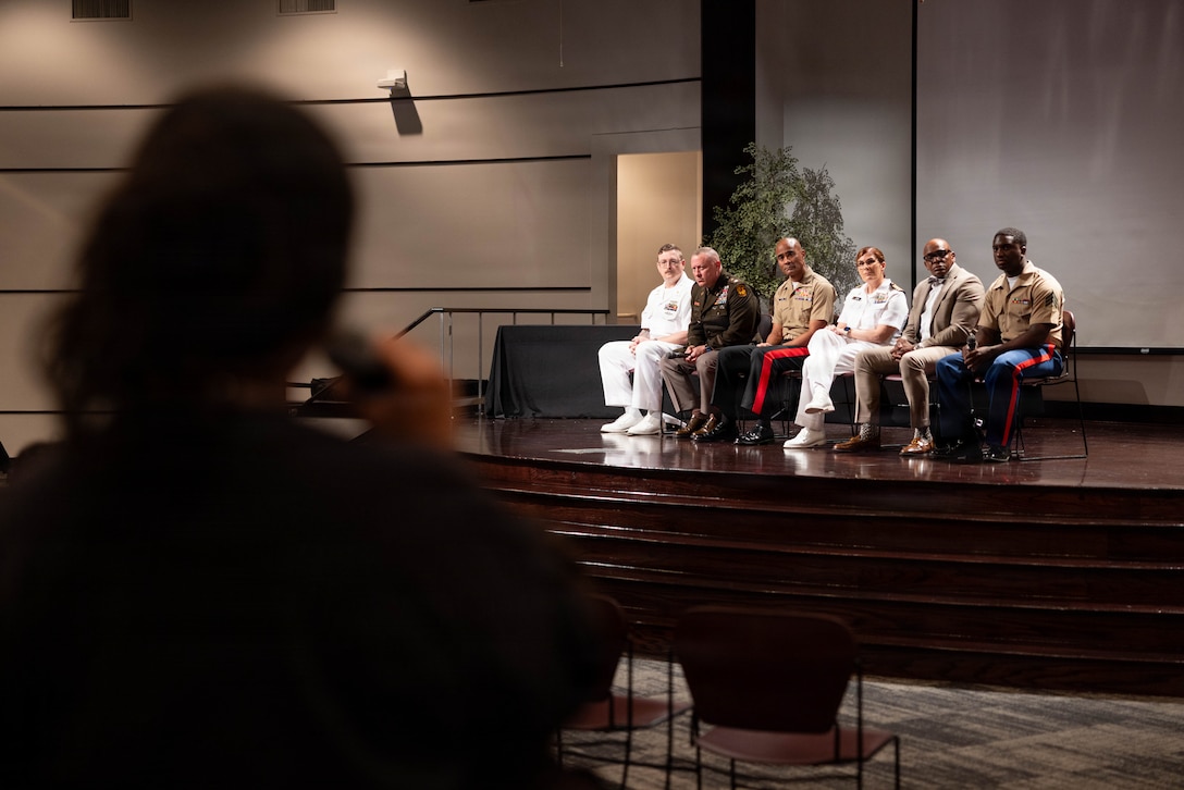 U.S. service members listen to a student from the Houston City College during an education panel in Houston, Texas, April 20, 2026. Held in partnership with Freedom 250, the inaugural Fleet Week Houston commemorates the 250-year legacy of America while showcasing its sea service’s cutting-edge technology and the unwavering dedication of our warfighters.  (U.S. Marine Corps photo by Lance Cpl. Orlanys Diaz Figueroa)