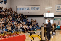 Dr. Shane Wines, an Albert Einstein Distinguished Educator Fellow at Naval Surface Warfare Center Carderock, speaks to over 200 students during the Calvert County Mathematics, Engineering, Science Achievement (MESA) Day at Huntingtown High School.