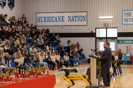 Dr. Shane Wines, an Albert Einstein Distinguished Educator Fellow at Naval Surface Warfare Center Carderock, speaks to over 200 students during the Calvert County Mathematics, Engineering, Science Achievement (MESA) Day at Huntingtown High School.