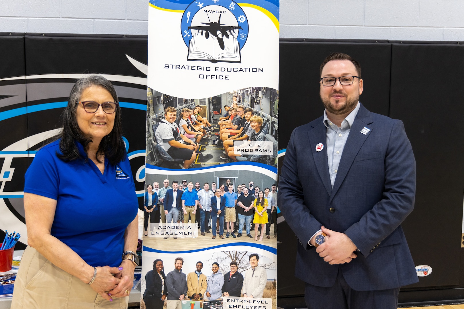 Ellen Servetnick, the K-12 Education Outreach Program Manager for the Naval Air Warfare Center Aircraft Division (NAWCAD), left, and Dr. Shane Wines, an Albert Einstein Distinguished Educator Fellow at the Naval Surface Warfare Center, Carderock Division (NSWCCD)