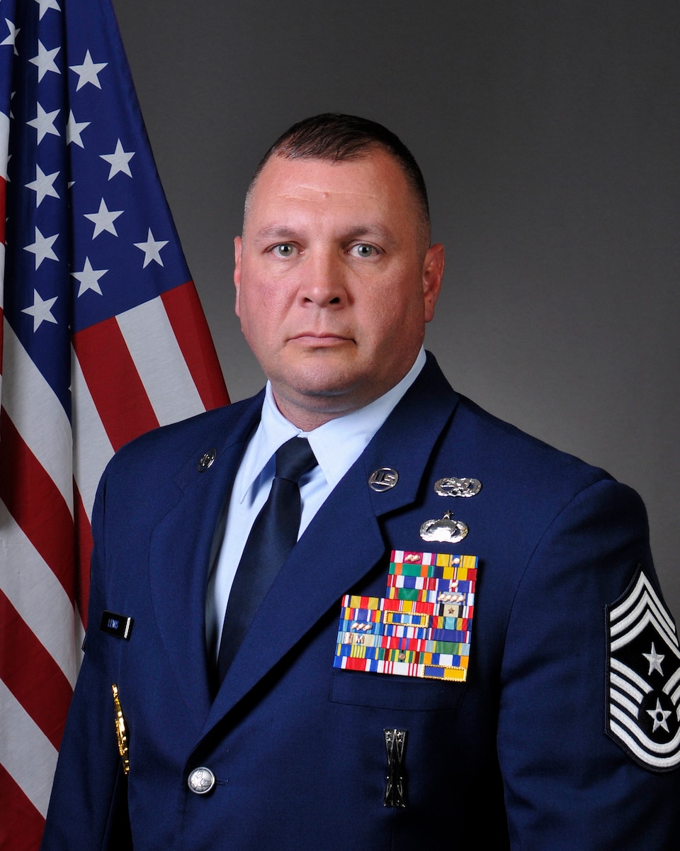 Official photo of CMSgt Lewis