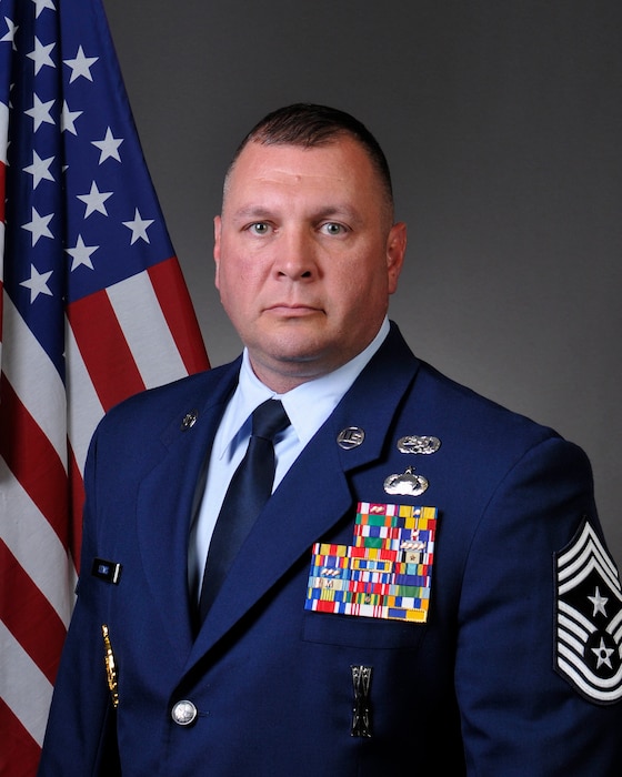 Official photo of CMSgt Lewis
