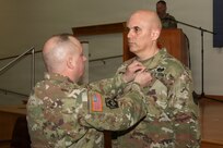 U.S. Army National Guard Soldiers, leaders and family members attend a change of command ceremony for the 166th Regiment – Regional Training Institute at Fort Indiantown Gap, Pennsylvania April 17, 2026. During the ceremony, Col. John Wenzel relinquished command to Lt. Col. Max Furman, symbolizing the transfer of authority within the organization. The 166th Regiment trains more than 5,000 Soldiers annually and serves as a premier Regional Training Institute within the Army National Guard. (U.S. Army National Guard photo by Sgt. 1st Class Shane Smith)
