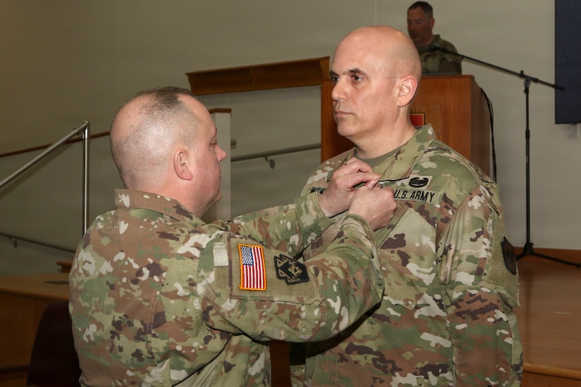 U.S. Army National Guard Soldiers, leaders and family members attend a change of command ceremony for the 166th Regiment – Regional Training Institute at Fort Indiantown Gap, Pennsylvania April 17, 2026. During the ceremony, Col. John Wenzel relinquished command to Lt. Col. Max Furman, symbolizing the transfer of authority within the organization. The 166th Regiment trains more than 5,000 Soldiers annually and serves as a premier Regional Training Institute within the Army National Guard. (U.S. Army National Guard photo by Sgt. 1st Class Shane Smith)