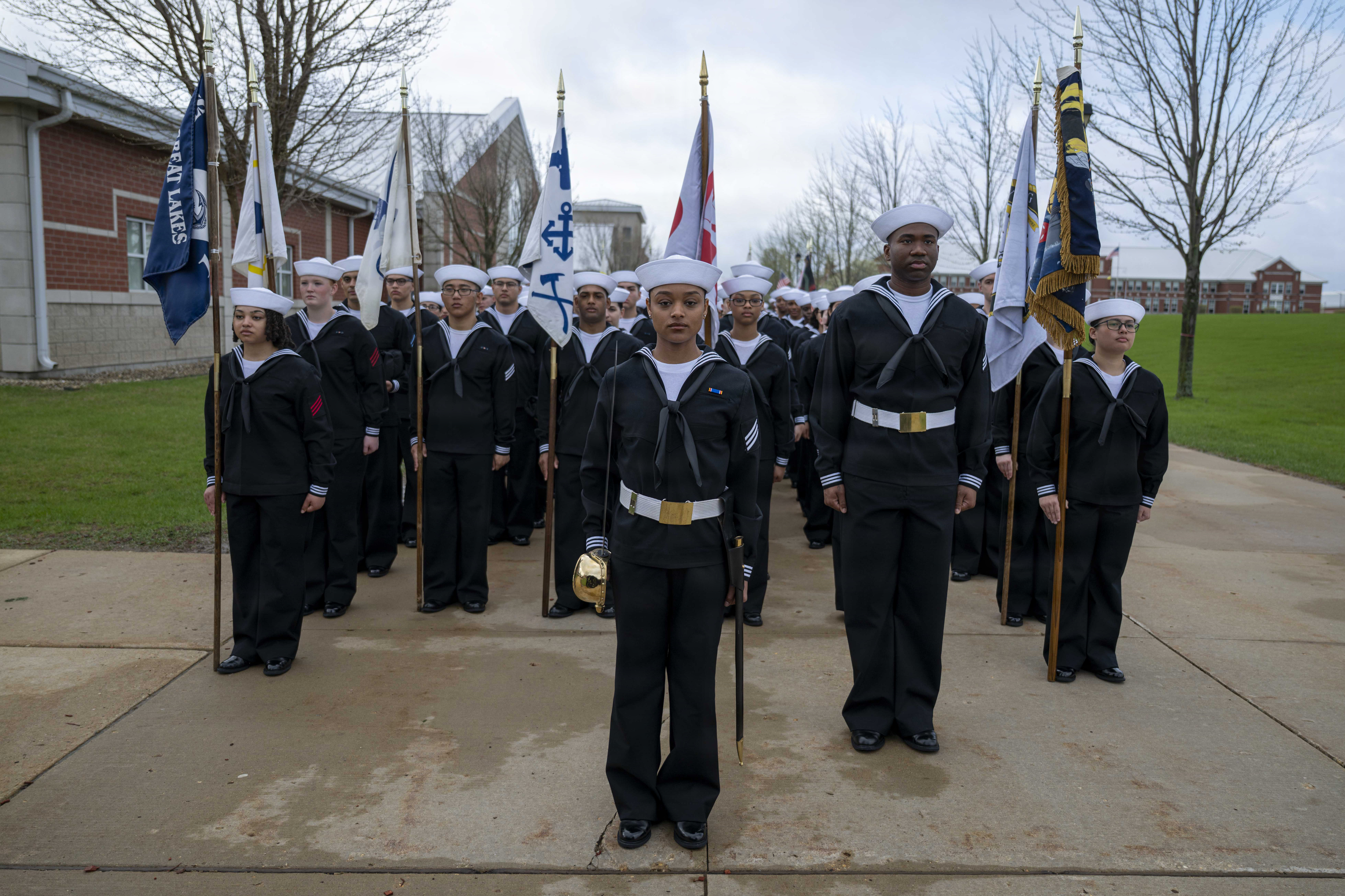 Sailors wait to march into Midway Ceremonial Drill Hall during pass-in-review onboard U.S. Navy Recruit Training Command in Great Lakes, April 16, 2026. Training is approximately nine weeks and all enlistees in the U.S. Navy begin their career at the command. More than 40,000 recruits train annually at the Navy’sonly boot camp. (U.S. Navy photo by Mass Communication Specialist 2nd Class Mykala Keckeisen)