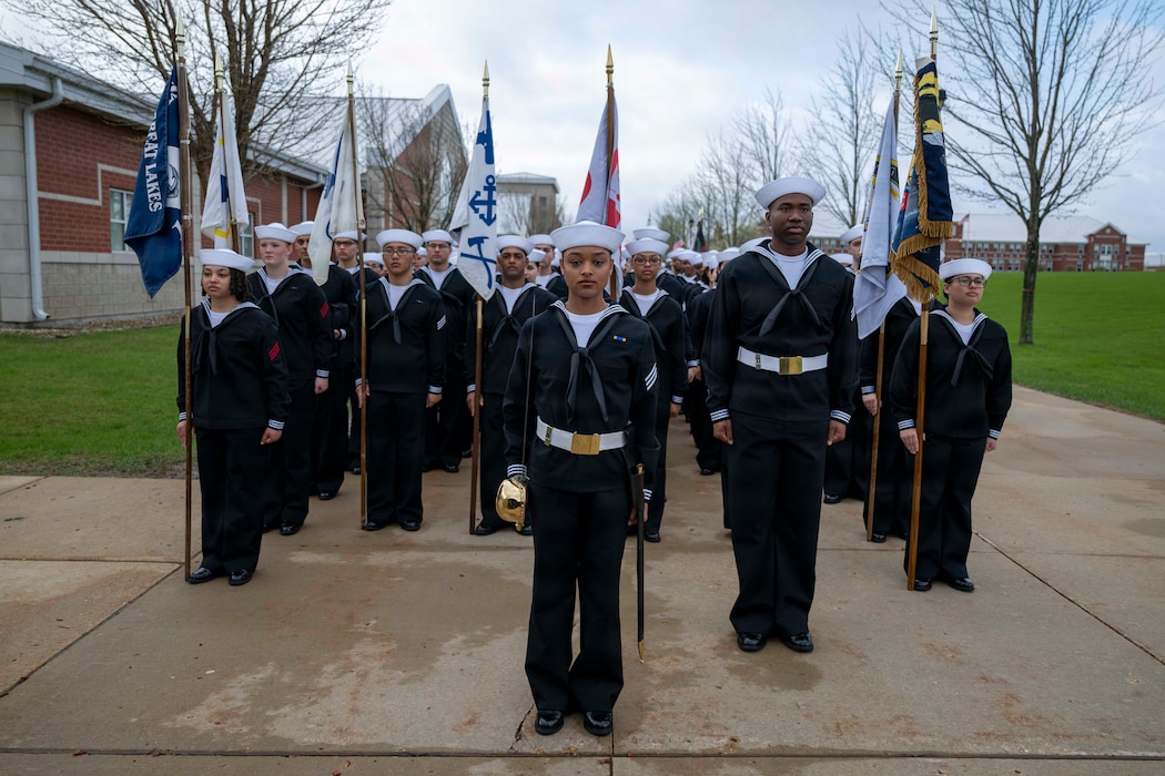 Sailors wait to march into Midway Ceremonial Drill Hall during pass-in-review onboard U.S. Navy Recruit Training Command in Great Lakes, April 16, 2026. Training is approximately nine weeks and all enlistees in the U.S. Navy begin their career at the command. More than 40,000 recruits train annually at the Navy’sonly boot camp. (U.S. Navy photo by Mass Communication Specialist 2nd Class Mykala Keckeisen)