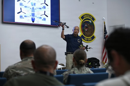 Tommy Cheng, Defense Contract Management Agency Blue List quality assurance specialist, briefs representatives from eight different agencies on the mechanics behind small Unmanned Aircraft Systems technology and marketplace constraint solutions during a training event hosted by the Hap Arnold Innovation Center, March Air Reserve Base, Calif., April 14, 2026.