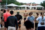 Retired U.S. Air Force Chief Master Sgt. Ramón “CZ” Colón-López, former senior enlisted advisor to the chairman of the Joint Chiefs of Staff, talks with Airmen from the Air Education and Training Command, and Air Force Personnel Center, after a physical training session at Joint Base San Antonio-Randolph, Texas, April 9, 2026. Colón-López thanked the group for the PT session and gave his thoughts on leadership and Airman development. (U.S. Air Force photo by Joshua J. Garcia)