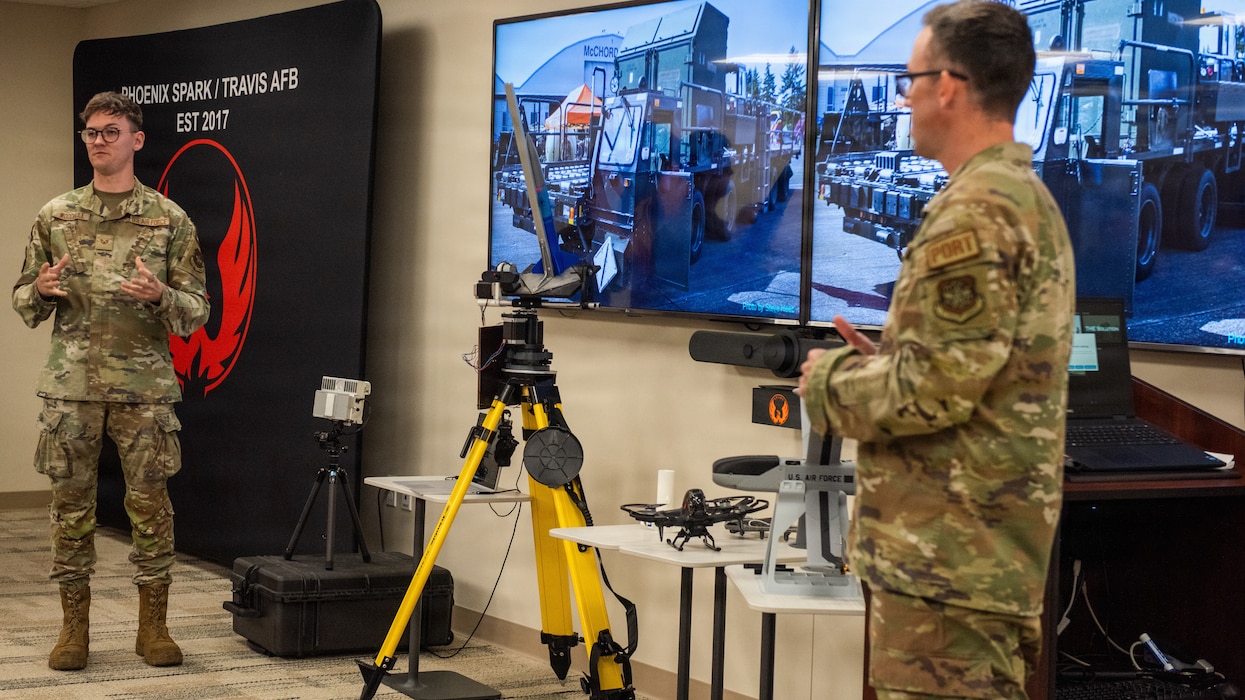 Presenters pitching their ideas to judges not pictured