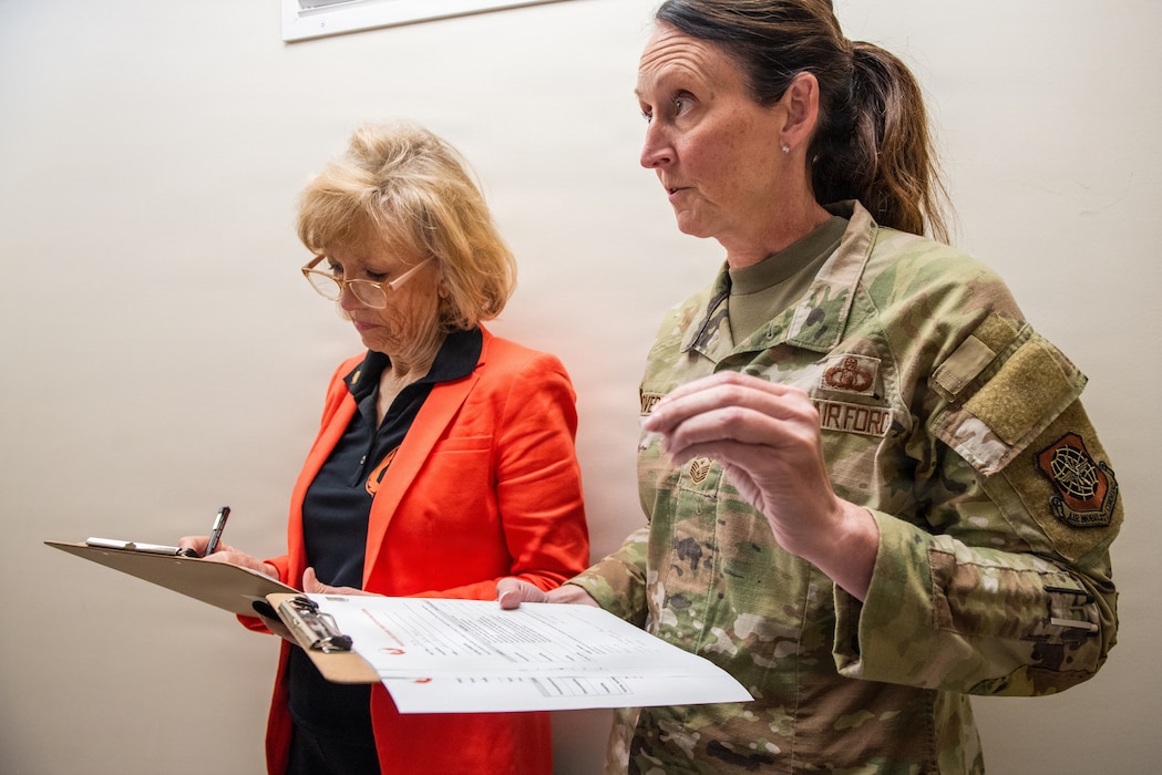 Judges go over notes during event