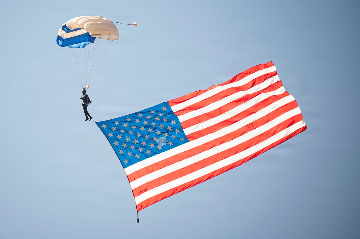 U.S. Air Force Academy Cadet Carter Beswick, a Wings of Blue parachutist, maneuvers during a demonstration jump at FIDAE in Santiago, Chile, April 11, 2026. The Wings of Blue team represents the next generation of Air Force leaders, showcasing discipline and skill while strengthening international partnerships through engagement at premier events like FIDAE. (U.S. Air Force photo by Airman 1st Class Samantha Melecio)