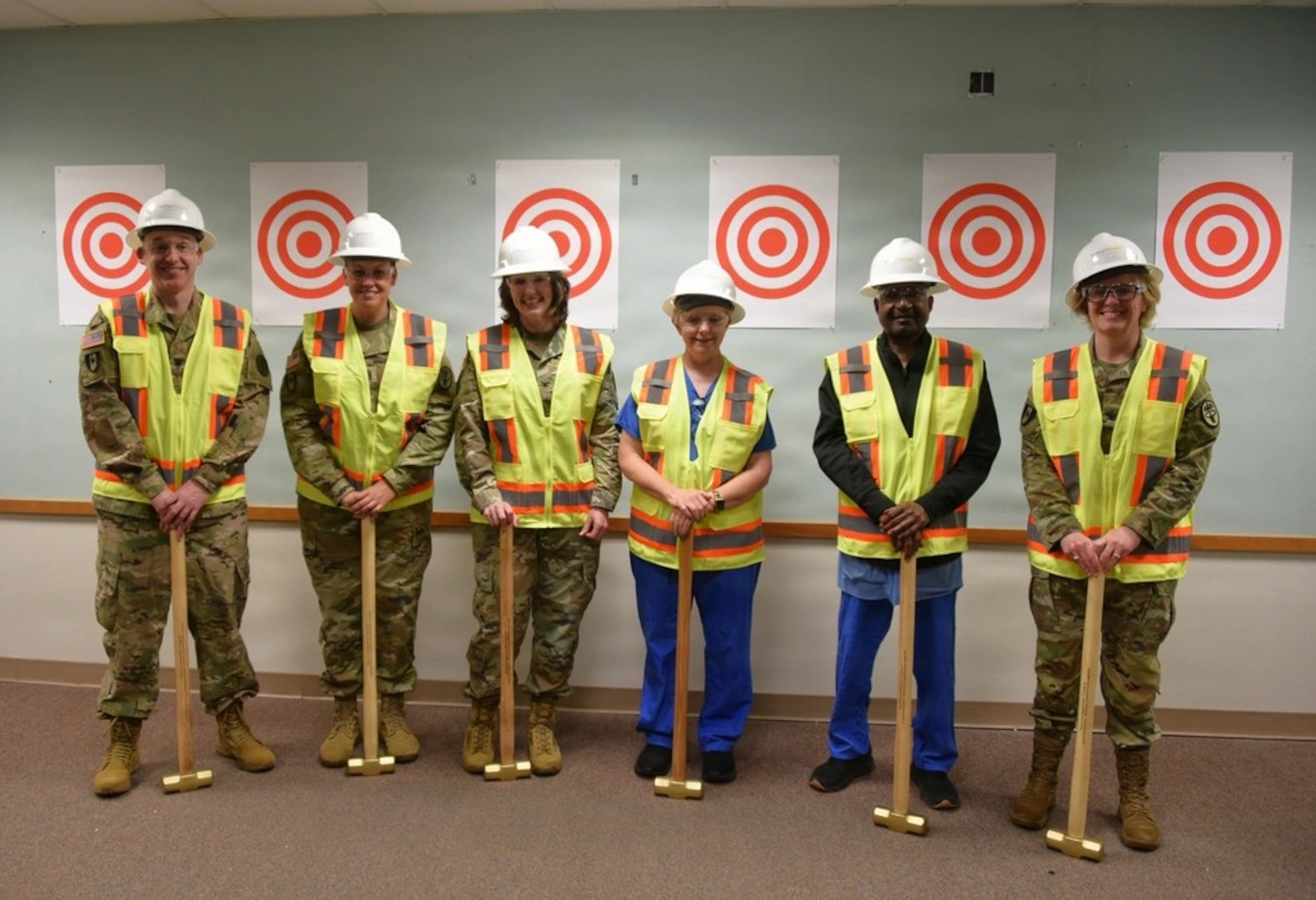 Womack Army Medical Center (WAMC) leaders and staff participated in a wall breaking ceremony on April 14, 2026. WAMC is set to undergo a transformational upgrade to its surgical capabilities, launching a multi-year project that will equip its team with the next generation of medical technology. The expansion will solidify WAMC’s position at the forefront of military medical care and enhance its mission to serve the Fort Bragg community. (Photo by Keisha Frith, Womack Army Medical Center Public Affairs Office)