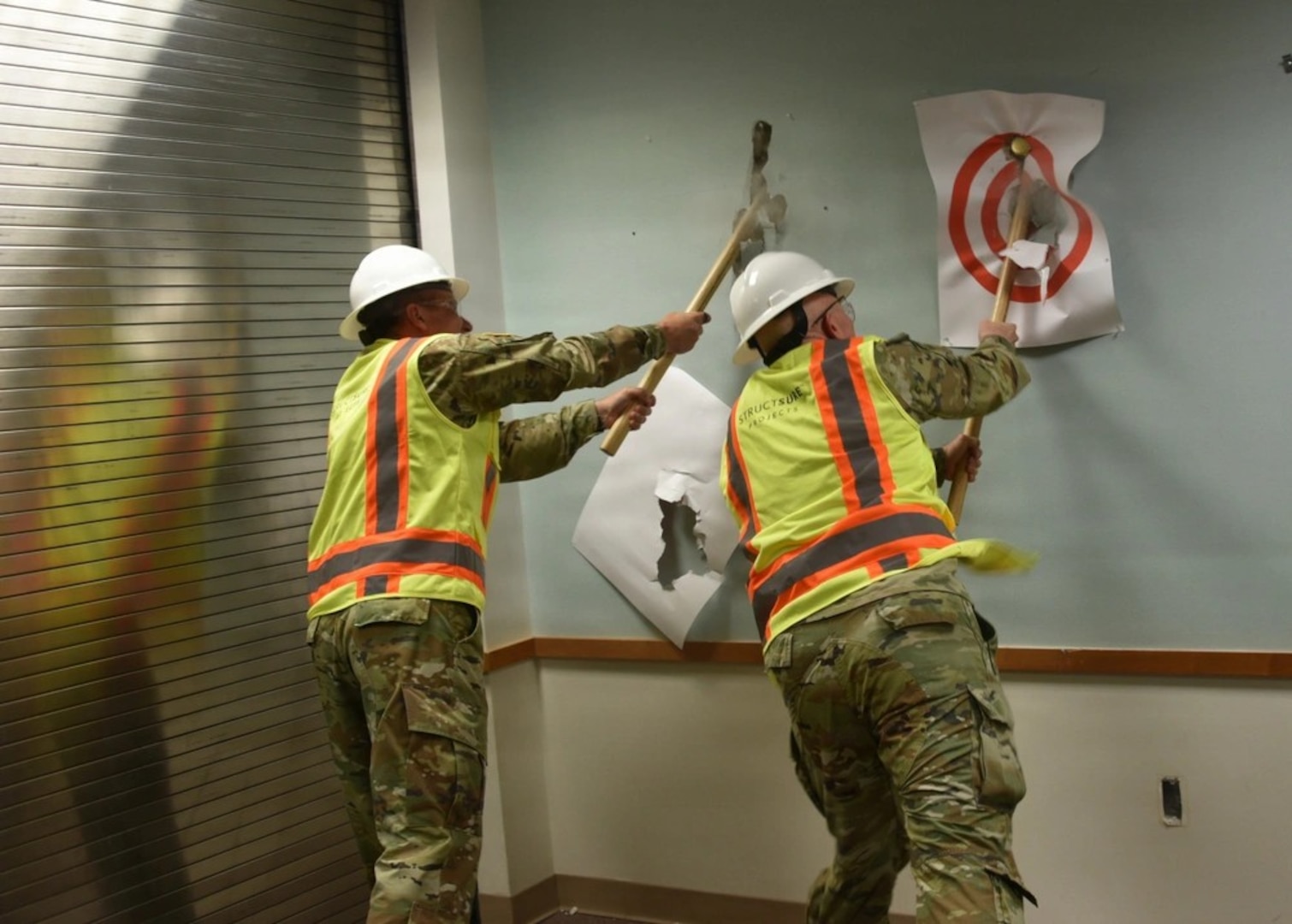 Womack Army Medical Center (WAMC) leaders and staff participated in a wall breaking ceremony on April 14, 2026. WAMC is set to undergo a transformational upgrade to its surgical capabilities, launching a multi-year project that will equip its team with the next generation of medical technology. The expansion will solidify WAMC’s position at the forefront of military medical care and enhance its mission to serve the Fort Bragg community. (Photo by Keisha Frith, Womack Army Medical Center Public Affairs Office)