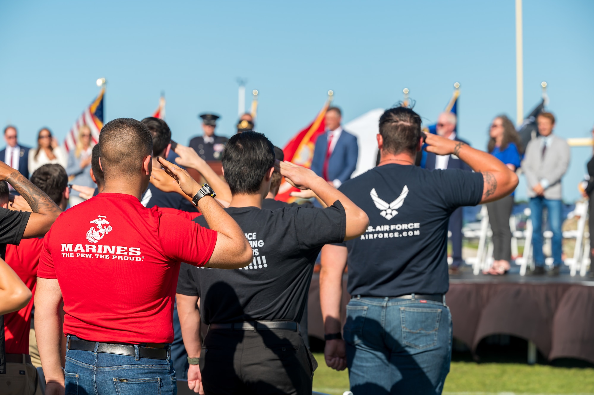 Enlistees from across all branches rise from their seat and salute during the 2026 Enlistment Ceremony of the Space Coast at Viera High School in Melbourne, Fla., April 17, 2026. U.S. Space Force Col. Brian Chatman, Space Launch Delta 45 commander, was invited to administer the oath of enlistment to more than 250 Brevard County students who committed to serve in the U.S. military. (U.S. Space Force photo by Gwendolyn Kurzen).