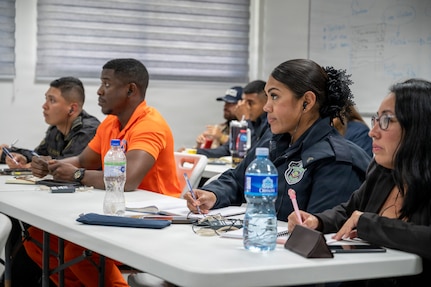 Public relations and communications specialists with several of Panama’s safety and security agencies take notes during a public affairs-focused subject matter expert exchange in Panama City, Feb. 24, 2026. Over the three-day exchange, public affairs professionals with the Missouri Guard and its partner nation, Panama, discussed current practices, ideas for process improvements and insights on communication strategy. (U.S. Air National Guard photo by Master Sgt. Stephanie Mundwiller)