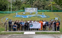Missouri National Guard Airmen and Soldiers, active duty U.S. Army Soldiers and members of 10 Panamanian safety and security agencies gather for a group photo at the Panama Superior Police Academy in Panama City on the last day of a public affairs-focused subject matter expert exchange, Feb. 26, 2026. The exchange brought together public affairs professionals from the Missouri National Guard and the Panamanian government in support of the long-standing cooperation between Missouri and Panama through the National Guard’s State Partnership Program. (U.S. Air National Guard photo by Master Sgt. Stephanie Mundwiller)