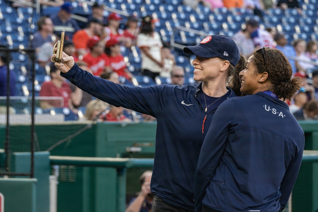 two women take a selfie.